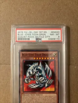 YuGiOh Blue Eyes Toon Dragon 2015 1st Edition Duelist Pack Battle City PSA 8 - Image 2