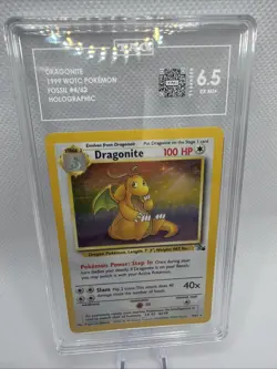 1999 Pokemon Fossil Dragonite Holo Rare Card 4/62 Graded TAG 6.5 - Image 1