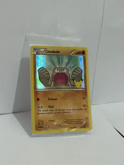 Pokemon Geodude Stamped Promo 20th Anniversary 43/83 (Sealed) - Image 1