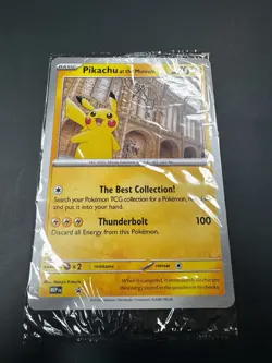 Pokemon x Natural History Museum Pikachu Jumbo Promo Card in hand - Image 1