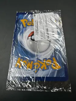 Pokemon x Natural History Museum Pikachu Jumbo Promo Card in hand - Image 2