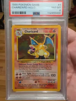 1999 POKEMON BASE SET UNLIMITED #4 CHARIZARD-HOLO PSA 8 - Image 1