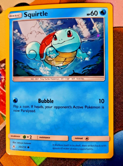 Pokemon TCG Unbroken Bonds Promos Squirtle Card 33/214 Cosmos Holo Rare LP - Image 1