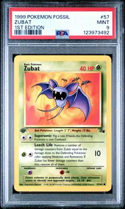 1999 POKEMON FOSSIL 1ST ED #57 ZUBAT PSA 9 - Image 1