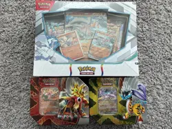 Pokemon Sealed Lot With Two Tins And Two Collection Boxes - Image 1