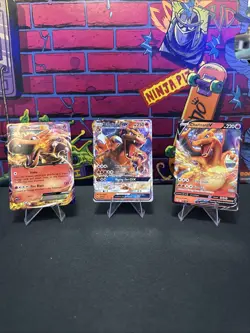 Pokemon TCG Charizard 11/106 Charizard 20/147 And Charizard V 019/189 Lot Of 3 - Image 1