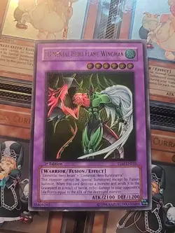 Yugioh Elemental Hero Flame Wingman TLM-EN035 Ultimate Rare 1st Edition - Image 1