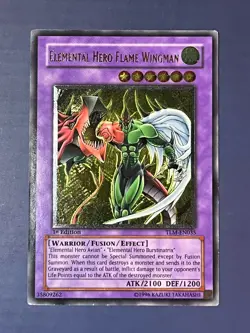 Yugioh Elemental Hero Flame Wingman TLM-EN035 Ultimate Rare 1st Edition LP/MP - Image 1