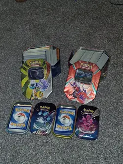2 small and 2 big tins FULL of pokemon cards. Over 800 cards. Random. Job lot. - Image 1