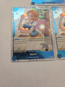 Nami Jolly Roger Foil P-053 One Piece Premium Booster -The Best- English NM X 3 - Image 2