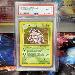 1999 POKEMON BASE SET UNLIMITED #11 NIDOKING-HOLO PSA 8 - Image 1