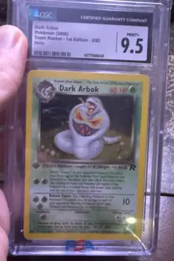 CGC 9.5 MINT+ Dark Arbok 2000 Team Rocket 1st Edition 2/82 Holo Pokemon Card - Image 1