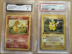 1999 Pokemon Jungle Pikachu First Edition PSA 8 & 2016 Charmander 8 - Image 1