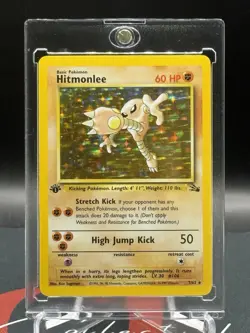 1st Edition Pokemon Hitmonlee Holo Rare Fossil 7/62 WoTC Vintage NM - Image 1