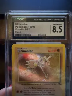CGC 8.5 Hitmonlee 1999 Fossil 7/62 Holo Pokemon Card - Image 2