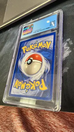 Hitmonlee 7/62 1st Edition Fossil Holo Rare 1999 Pokemon Card CGC 7 - Image 4