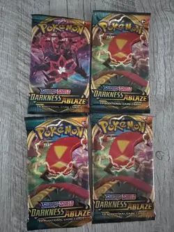 Pokemon DARKNESS ABLAZE - 4 (Four) -Factory Sealed Booster Pack Bundle - English - Image 1