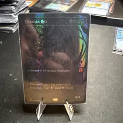 1x Foil Tyrranax Rex (Oil Slick Raised Foil) - Phyrexia: All Will Be One NM - MT - Image 1