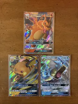 Charizard GX, Gyrados GX & Raichu GX Near Mint Black Star Promo Pokemon Cards - Image 1