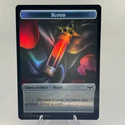 Chandra Dressed to Kill Emblem - Blood Token - Double Sided - Foil - Crimson Vow - Image 2