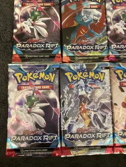 Pokemon TCG SV4 Paradox Rift Booster Pack Lot of 12 Factory Sealed Card Packs - Image 4
