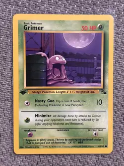 Pokemon TCG Grimer Fossil 1st Edition Common Card 48/62 NM Condition - Image 1