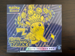 Pokemon TCG Surging Sparks ETB Elite Trainer Box - Brand New Sealed - Small Tear - Image 1