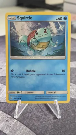 Pokemon TCG Unbroken Bonds Promos Squirtle Card 33/214 Cosmos Holo Rare - Image 1
