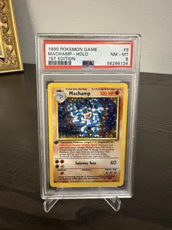 1999 Pokemon Game Machamp Holo 1st Edition 8/102 PSA 8 NM-MT - Image 1