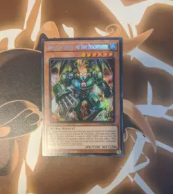 Yu-Gi-Oh! Dinomight Knight, the True Dracofighter BLMM-EN126 Secret Rare Card - Image 1