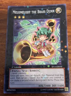 2014 Yu Gi Oh Star Pack 2014 1st Edition Starfoil Melomelody the Brass Djinn - Image 1