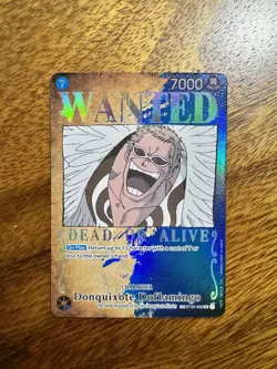 One Piece TCG Donquixote Doflamingo Wanted SP AA OP03/ST03-009 NM - Image 1