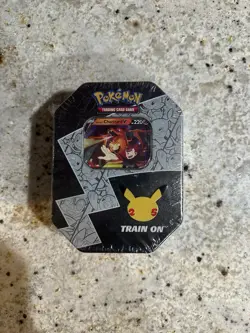 2021 Pokemon Celebrations Lance's Charizard V International Sealed Tin - Image 1