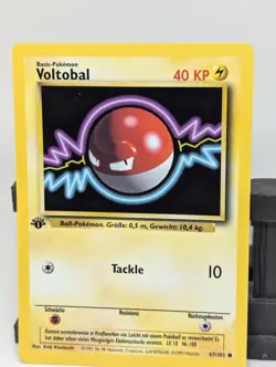 1st Edition Voltorb (Voltobal) 67/102 NM German Base Set Pokemon Card - Image 1