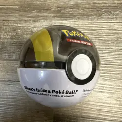 Pokemon TCG Pokeball Tin Pack Ultra Ball D23 with 3 Booster Packs - Image 1