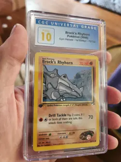 (POP 3) CGC 10 PRISTINE Brock's Rhyhorn 70/132 1st Edition Pokemon Gym Heroes - Image 1