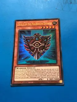 YUGIOH Ultra Rare Shield Of The Millennium Dynasty INFO-EN003 1st Edition - Image 1