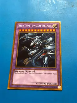 YUGIOH Gold Rare Blue-Eyes Ultimate Dragon PGLD-EN055 1st Edition - Image 1