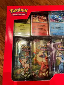 Pokemon TCG: Scarlet & Violet - Prismatic Evolutions 8 Pack Mini Tin Set - Image 4