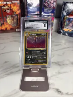 Pokemon TCG Houndoom 2000 Awakening Legends Holo #229 CGC 8 - Image 1