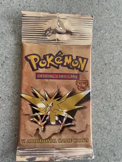 Pokemon (WOC06159) Fossil Unlimited Booster Pack - Factory Sealed (1999) - Image 1