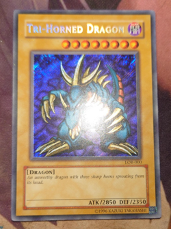 Tri - Horned Dragon LOB-000 Secret Rare Unlimited Edition YuGiOh - Image 1