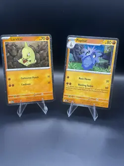Larvitar 105/197 & Pupitar 106/197 Cosmos Holos Obsidian Flames Pokemon TCG NM - Image 1