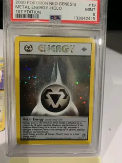 2000 WOTC POKEMON NEO GENESIS 1ST EDITION METAL ENERGY 19/111 HOLO RARE PSA 9 - Image 1