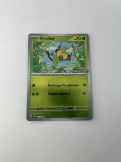 LP - 2024 Pokemon Indonesian Topeng Transfiguras! 127/SV-P Grookey Reverse Foil - Image 1