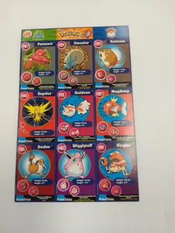 POKEMON 1ST MOVIE CARDS 1999 BURGER KING #6 MASTER TRAINER SET UNCUT Uncut Sheet - Image 1