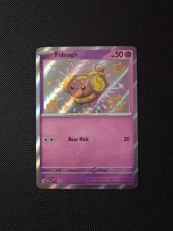 Fidough SVP 069 - Shiny Holo Promo -Paldean Fates - Pokemon - NM - Image 1