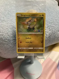 **SEALED** Jangmo-o Holo 2017 Pokemon Toys R Us Promo Card (75/111) - Image 1