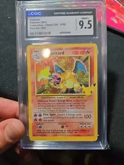 CGC 9.5 Charizard Celebrations Classic 4/102 Holo Base Set Pokemon Card 2021 - Image 1