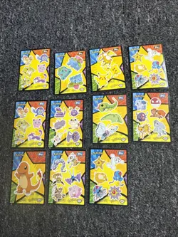 Topps Pokemon 1st Movie Puzzle/Sticker Set 1999 Black/Blue Logo - Image 1